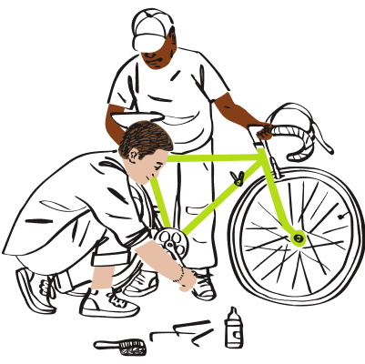 Man with light skin and dark brown hair fixes bicycle propped up by boy with dark skin